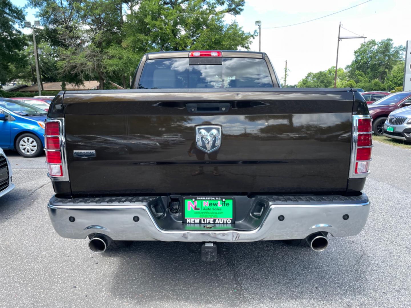 2013 BROWN RAM 1500 LARAMIE (1C6RR6NT8DS) with an 5.7L engine, Automatic transmission, located at 5103 Dorchester Rd., Charleston, SC, 29418-5607, (843) 767-1122, 36.245171, -115.228050 - Clean CarFax (no accidents reported!) Leather, Navigation, Backup Camera, CD/Sat/Bluetooth, Dual Climate Control, Power Everything (windows, locks, seats, mirrors), Heated/Cooled Seats, Heated Rear Seats, Heated Steering Wheel, Power Sliding Rear Window, Power Inverter, Push Button Start, Keyless E - Photo#5